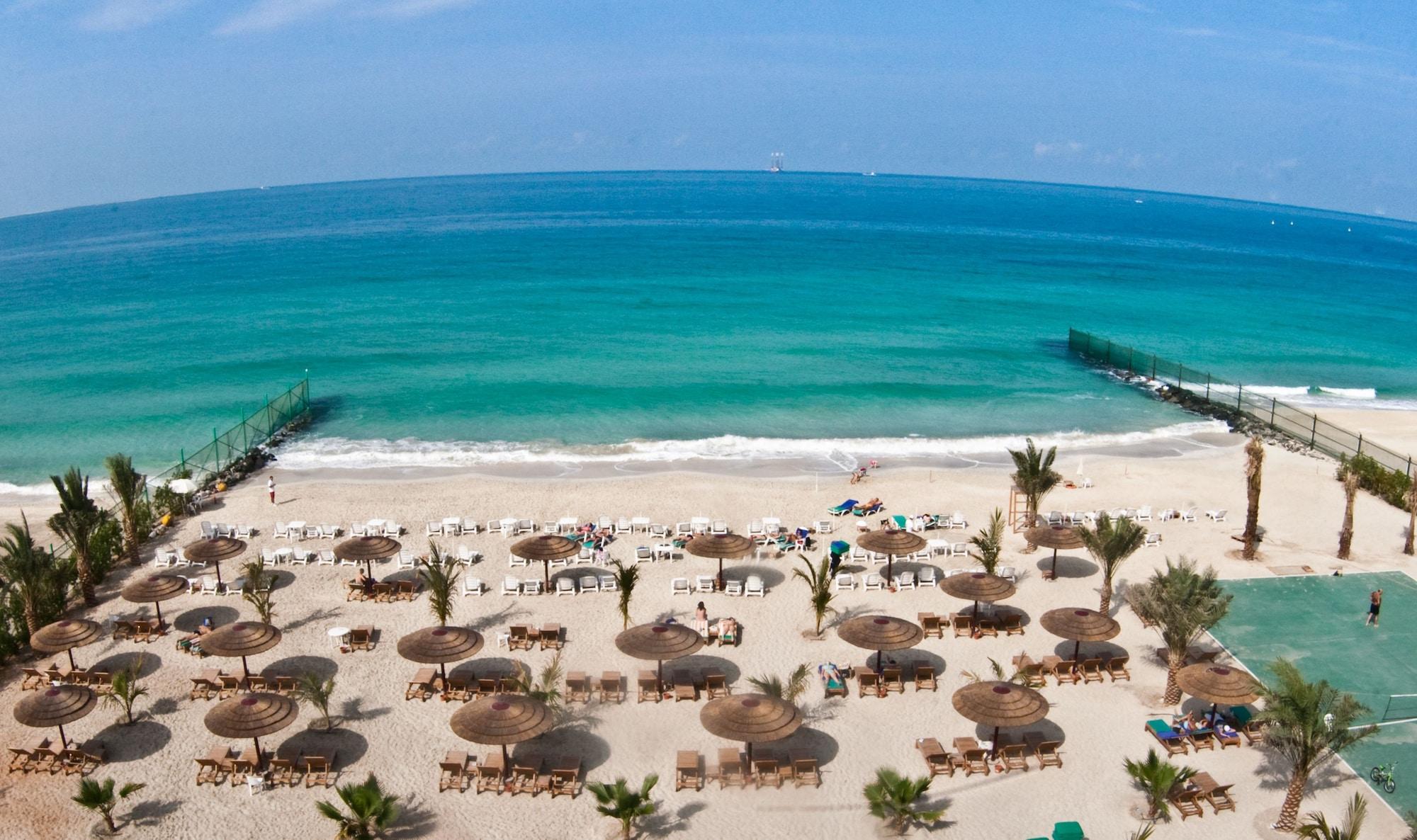 사하라 비치 리조트 앤 스파 샤르자 외부 사진 Beach at Jumeirah Beach Hotel